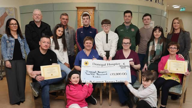 Making the presentation, Julie's husband Stephen, her children Ethan, Adam and Sophie and Juilie’s mother Ursula McCormack, were joined by family and close friends