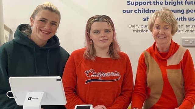 Yulia and Bernadette supporting Rosie with work experience in Síoraí Clothing, which is run by Spraoi agus Spórt in Carn.