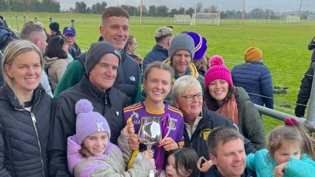 Niamh Carr with family after winning the Leinster title