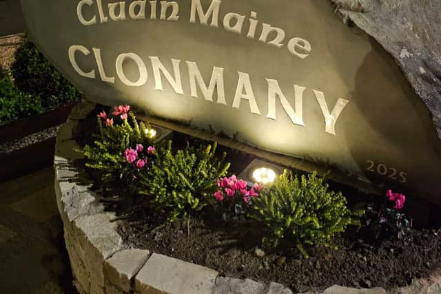 Pride in Clonmany with beautifully crafted stone signposts installed