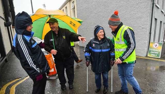 The stewards work in the sun and the rain when big games are on in Ballybofey with Eddie Walsh and Alan Martin welcoming Dublin supporters Picture: Sportsfile