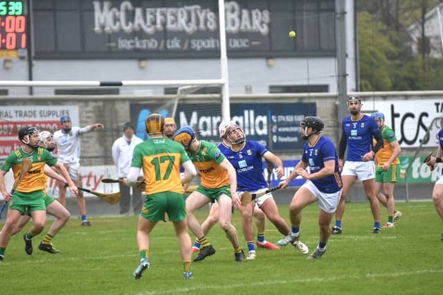 Players from both side await a dropping ball in the Christy Ring Cup at O'Donnell Parlk. Photos: Geraldine Diver