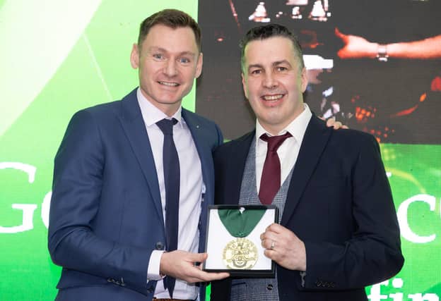 Gerard McGlynn, winner of the 2024 Donegal Sports Star Award for Darts, with special guest David Gillick