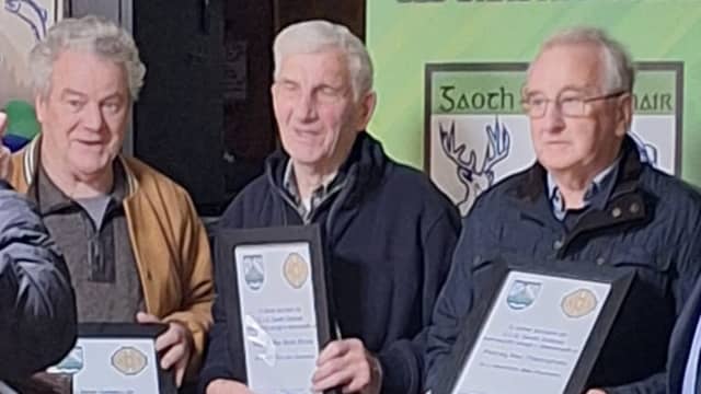 McBride, Breslin and McGinley with their Hall of Fame certificates