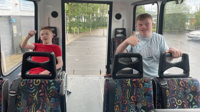 : Teenagers Matthew Friel and Kealan Doherty on a bus hired by Spraoi agus Sport