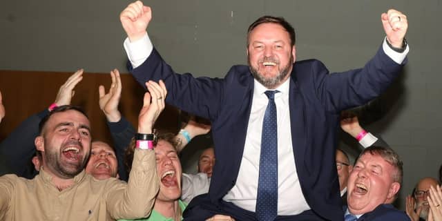 Padraig Mac Lochlainn celebrates his re-election