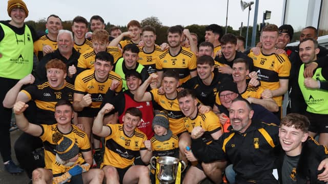 The St Eunan'splayers and management celebrate their victory in the Donegal SFC final. Photos: Thomas Gallagher