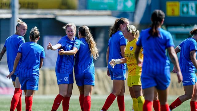 Erin McLaughlin is congratulated by her new teammates following a goal against Watford. Photo: Portsmouth Women