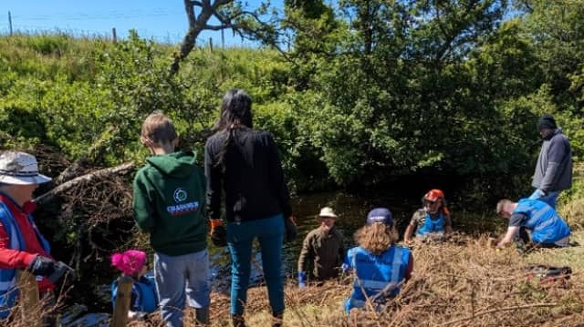 Volunteers taking part in the riverbank restoration event in Culdaff