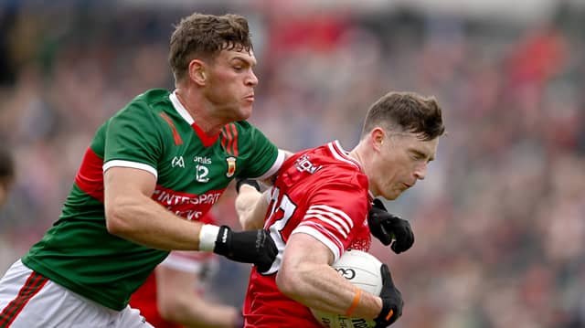 Gareth McKinless of Derry in action against Jordan Flynn of Mayo during the All-Ireland preliminary quarter-final in Castlebar