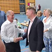 Declan Meehan and Liam Blaney congratulate one another after being elected in the Milford LEA - they will work side by side for the next five years
