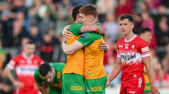 Donegal players Ciarán Moore and Daire Ó Baoill embrace each other after their win over Derry two weeks ago
