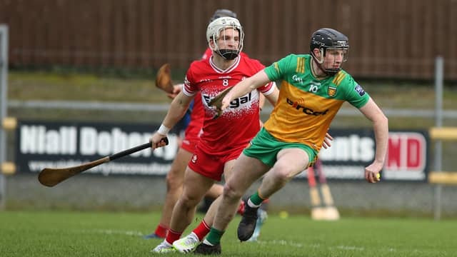 Conor Gartland gets away from Cormac O'Doherty