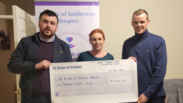 Callum Harley and Christopher Barney with Friends of Inishowen Hospice committee member Elaine Doherty