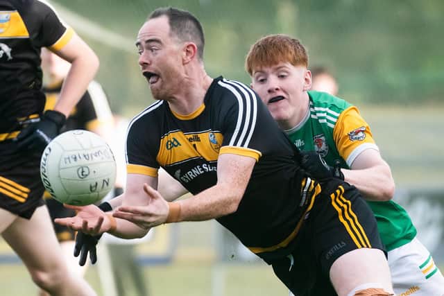 Three times the sides were level in the opening 15 minutes, McGroddy stroking over a couple of delightful frees for Downings with a delicious Christopher McLaughlin effort from play among the early Malin highlights.