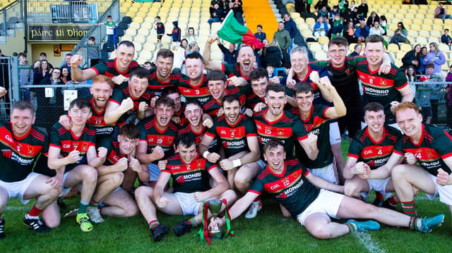 Carndonagh celebrate their Intermediate Hurling Cup victory over MacCumhaills.