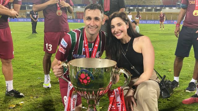 Carl McHugh and partner Orla celebrate with the ISL title.