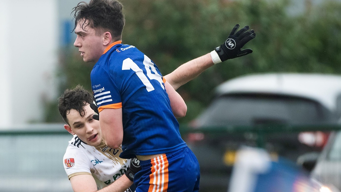 Joel Bradley Walsh of ATU Donegal is tackled by his county colleague Coalan McColgan, who was in action for Ulster University