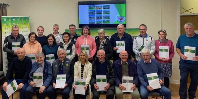 Downings club members with Ulster Council President Ciaran McLaughlin and Donegal GAA Chairperson Mick McGrath.