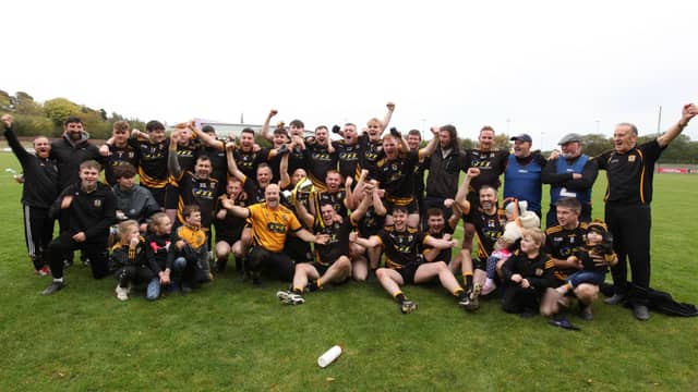 Naomh Ultan celebrate their victory in the final of the final of the Donegal A Football Championship. PHOTOS: THOMAS GALLAGHER