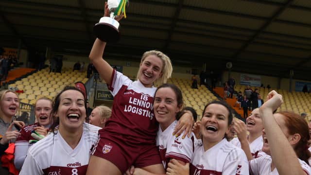 Termon captain Maria Carr with Nicole McLaughlin, Roisin McCafferty and Geraldine McLaughlin with the Donna Dunnion Boyle Memorial Cup. PHOTOS: THOMAS GALLAGHER