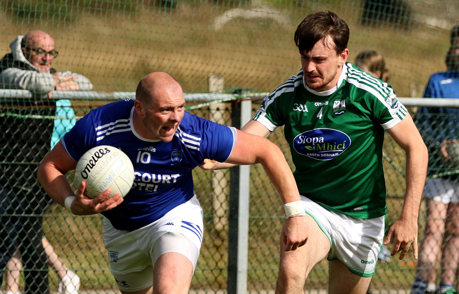 Dermot Molloy tries to get away from Gary McFadden in Davy Brennan Park Picture: Thomas Gallagher