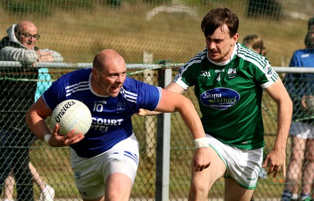 Dermot Molloy tries to get away from Gary McFadden in Davy Brennan Park Picture: Thomas Gallagher