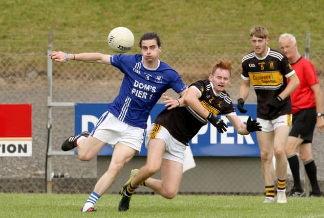 Brian Fegan, Four Masters and Conr Jack McManus Bundoran tussle for possession Picture: Thomas Gallagher
