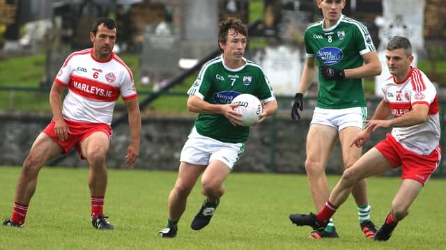 Fergal Delaney of Gaoth Dobhair ahead of Frank McGlynn and Daniel McGlynn from Glenfin. Photos: Thomas Gallagher