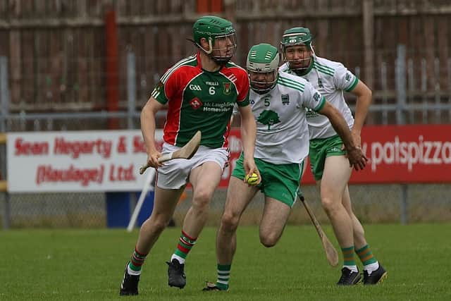 Carndonagh settled the swifter and Doherty swung over a great point, over his shoulder after just a minute. The Inishowen men were on top in most sectors and Doherty obliged with another long- range effort to put his side into a 0-2 to 0-0 lead by the seventh minute in a wind assisted first half.