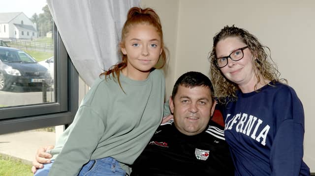 Trevor Melly pictured in his home at Ascall Bhride, Lettemacaward, yesterday with his wife Louise and their daughter Erin. Photos: Thomas Gallagher