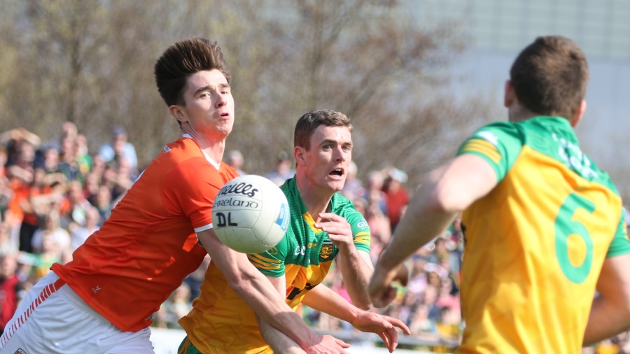 Donegal's Caolan Ward gets his pass off to Eoghan Ban Gallagher on Sunday. Photo Thomas Gallagher