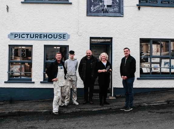 From left to right: Painter and decorator Finbarr Orr, his son Adam, Brian and Eileen McDaid of the Picture House studio and Brian McCormack of Letterkenny Tidy Towns