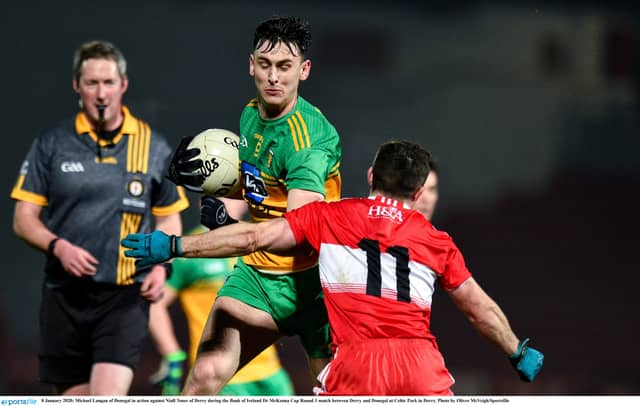 Michael Langan of Donegal in action against Niall Toner of Derry during the Bank of Ireland Dr McKenna Cup Round 3 match in 2020