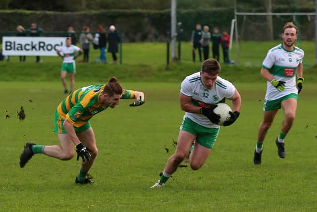Two points from the impressive Michael McKenna and two Philip Patton frees were added to by a brilliant run and fisted point from Johnny Gethins to leave it 1-13 to 0-6 at the second half water break.