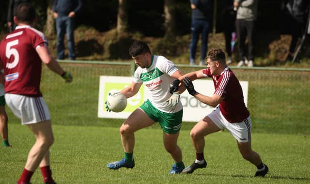 Shane Conneely on the ball for St Naul's against Termon