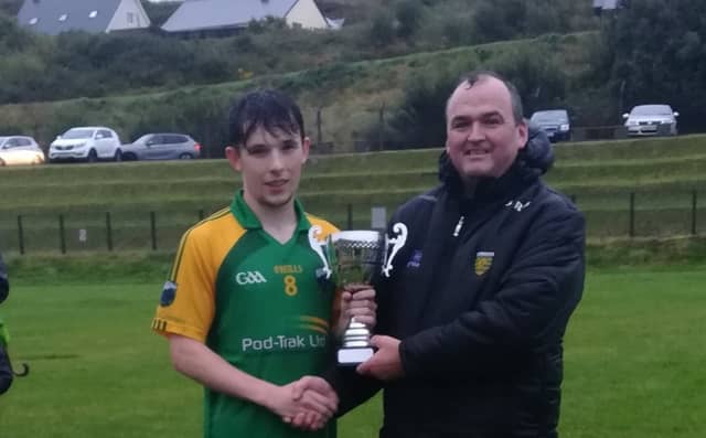 Aaron Doherty pictured earlier this year accepting a Divisional Cup from Paul Martin