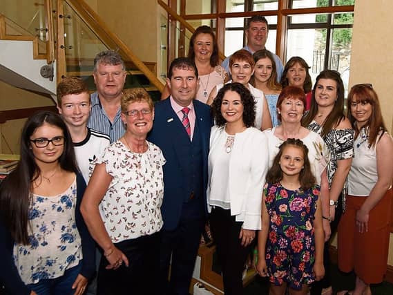 Cllr Micheál Naughton with his family at his first Donegal County Council meeting after filling the seat held previously by the late Sean McEniff. Photo: Clive Wasson