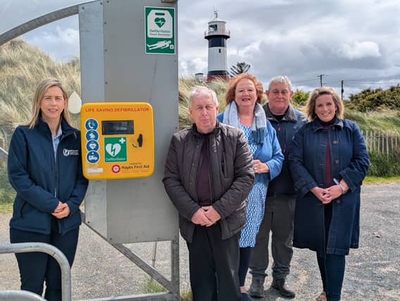 Group pictured at the new Inishowen Credit Union defib at Shroove's Blue Flag beach. Included are, Joanne McCormick, Catherine Gillespie, Paddy Gillespie, Josephine Mulhall, and Charlie Cavanagh.