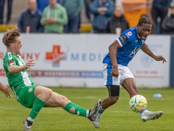 Alex Fanle gets a cross over despite a challenge from a Bray defender. (North West newspix)