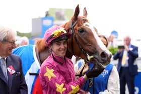 Dylan Browne McMonagle with Thundering On after winning the Betfred Oaks on Ladies Day of The Betfred Derby Festival at Epsom Downs Racecourse