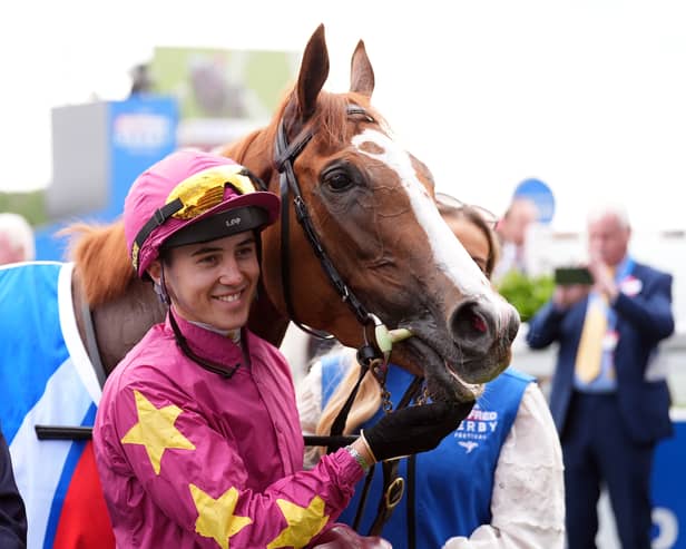 Dylan Browne McMonagle with Thundering On after winning the Betfred Oaks on Ladies Day of The Betfred Derby Festival at Epsom Downs Racecourse