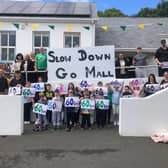 Pupils at Scoil Bhride in Lettermacaward remind motorists to slow down and adhere to 60km