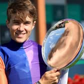 Jockey Dylan Browne McMonagle celebrates with the trophy after winning the Juddmonte Irish Oaks on Johanna Walsh on day one of the Juddmonte Irish Oaks Weekend at The Curragh Racecourse in Kildare. 