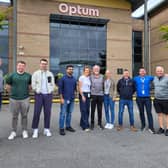 Donegal Half Marathon Committee members Paddy Hannigan, Danny McDaid and Brendan McDaid pictured this week with staff members from Optum.