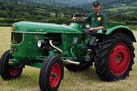 Michael Keegan on his grandfather's tractor