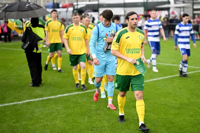 Bonagee United captain Gareth Harkin leads his side out for the FAI National League Group 1 match