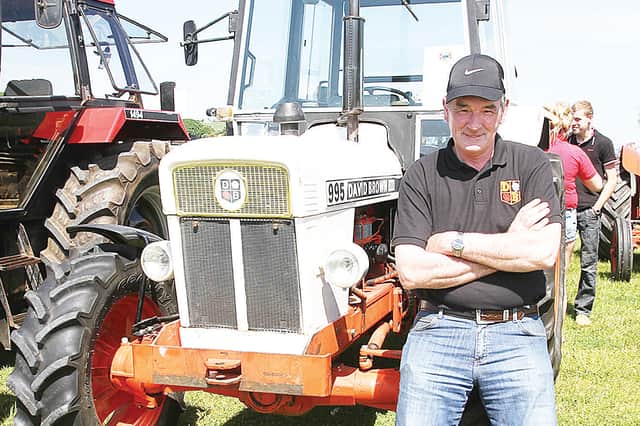 Danny McColgan pictured with his beloved David Brown 995 4-wheel drive tractor
