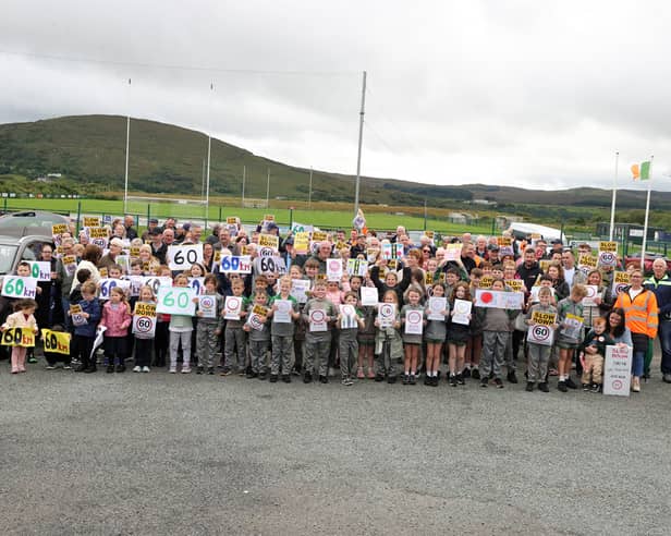 Locals, schools and community groups gathered at the speeding protest