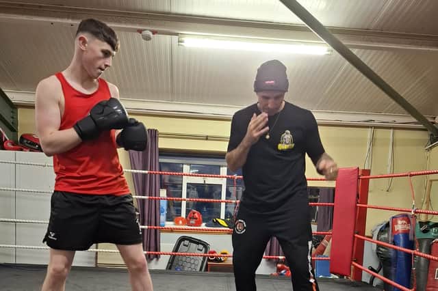 Coach John Hutchinson puts Conan Kearney through his paces